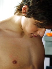 Handsome twink passionately gobbling on a hard-on