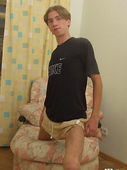 Twink grabs his crotch and poses for the camera