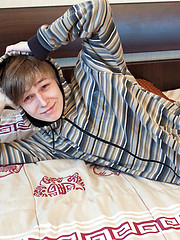 Cute skinny boy strips off to show all his goods