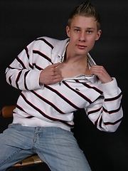 Cute european twink Andre posing naked and shows his long uncut cock