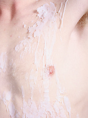 Gay boy Daniel stands tied to the wall and gets wax torture