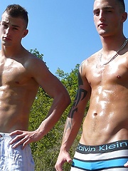 Two gay twins posing outdoor