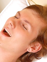 Sweet teen boy inserting fingers in own tight hole