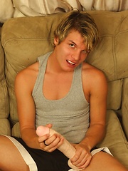 Blonde twink boy plays with huge white dildo