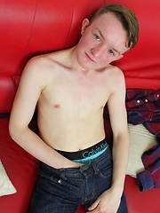 Smooth twink Brett Wright busts a nut over his stomach.