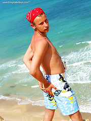 Straight boy Sander solo posing on the beach